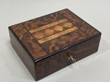 an image of a wooden box on a white surface