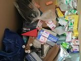 a cardboard box filled with various items in it