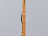 an image of a wooden pen on a clear stand