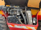 an image of a tractor with a large engine in the back of it
