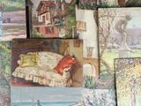 many paintings of different colors and sizes on the wall