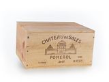 wooden box with a logo of chateau de soles pomerol on it