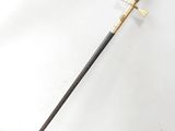 an image of a sword with a wooden handle on a white surface