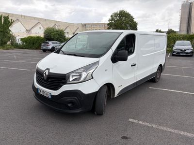 a white van that is parked in a parking lot