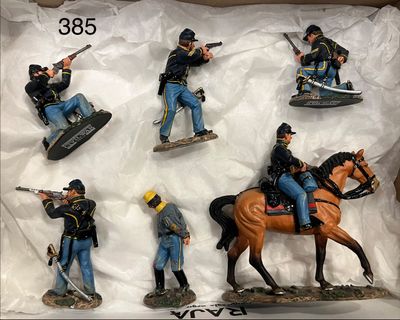six figurines of a man on a horse and a man on a horse