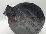 an image of a black and white plate with writing on it