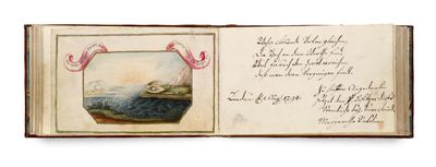 an open book with a picture of a bird in a bowl on top of it