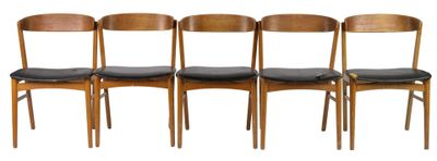 four wooden chairs with black leather seats on a white background