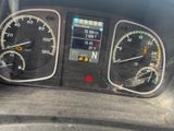a close up of a car dashboard with a speedometer and other instruments