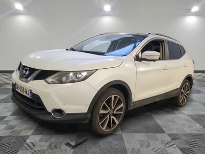 the white nissan qx - v is parked on a checkered floor