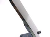 a close up of a cell phone on a stand