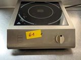 an image of a stove top with a price tag on it