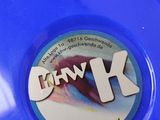a blue bowl with a sticker on it that says kkw k