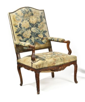 pair of early 20th century carved walnut armchairs with floral upholstered upholstered back