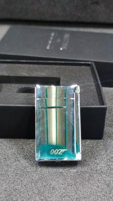 a lighter that is sitting in a box on a table