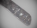 a knife that has holes in the middle of it