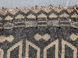 a close up of a beaded purse on a table