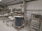 a large room with a lot of shelves and tables