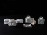 a lot of glass items that are on a table