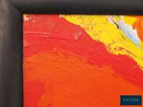 painting of a red and yellow abstract painting in a black frame