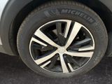 a close up view of a tire on a car