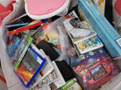a bag full of games and other items in it