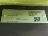 a close up of a label on a machine that has a qr code on it