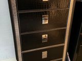 black metal filing cabinet with five drawers in a room