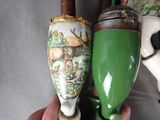 two vases that are sitting next to each other