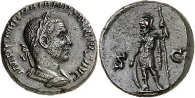 a silver coin with a man holding a spear and a sword