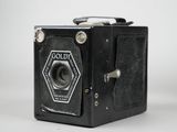 an old camera that is sitting on a table