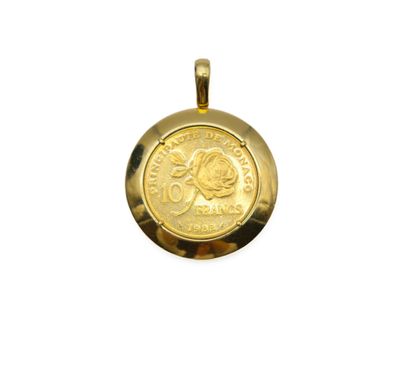 a close up of a gold coin on a white background