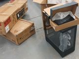 many boxes that are sitting on the floor next to each other
