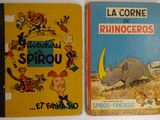 Deux livres pour enfants sont posés sur une surface blanche