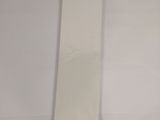 a piece of white paper on a white surface