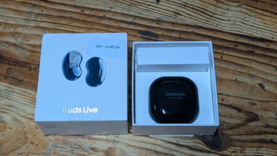 a box with a pair of ear buds inside of it