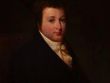 portrait d'un homme en costume noir et chemise blanche
