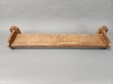 an old wooden shelf with a wooden handle on a white background