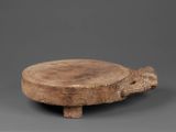 an image of a wooden bowl with a turtle on top of it