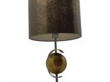 the table lamp has a brown shade on top of it