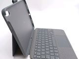 a laptop that has a keyboard on top of it