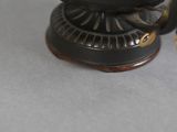 a close up view of a statue of a cat on a table