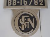 a close up of a sign on the side of a building