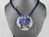 necklace with a blue flower on a blue string