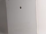 a white box with a lock on it on a white surface