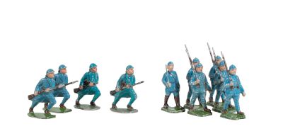 figurines of soldiers in blue uniforms are lined up in a line
