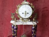 a clock that is sitting on top of a table