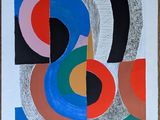 une peinture abstraite composée de différentes couleurs et formes sur un papier blanc