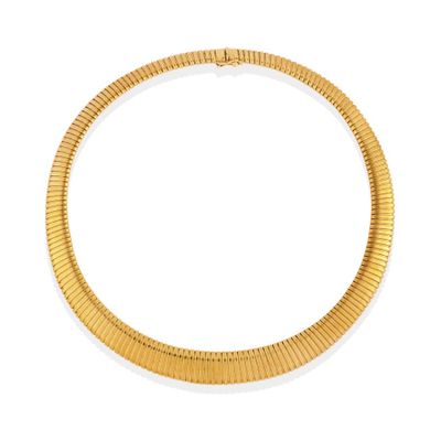 a gold necklace on a white background