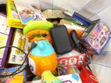 a basket full of toys and other items for a child ' s play
